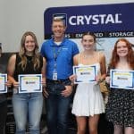 Crystal Group president, Aaron Maue, presents the internal scholarship recipients with their certificates. (From left to right, Lena Randle, Emily Kono, Aaron Maue, Chloe McDermott and Claire McAllister.)