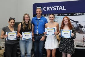 Crystal Group president, Aaron Maue, presents the internal scholarship recipients with their certificates. (From left to right, Lena Randle, Emily Kono, Aaron Maue, Chloe McDermott and Claire McAllister.)